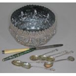 An eastern white metal bowl and contents comprising a hallmarked silver and ivory handled knife, a
