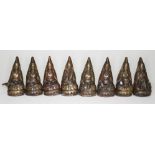 A set of eight Nepalese bronze figures, each depicting a musician, height 10cm.