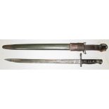 A WWI 1913 Remington US bayonet with scabbard and leather sheath with lock mechanism, length 59cm.