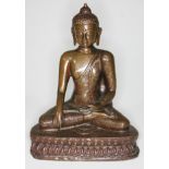 An eastern bronze buddha on lotus base, height 19.5cm.