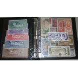 An album of mainly Europe and world bank notes and coins including Jason Islands 1979 complete