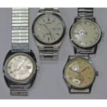 A group of four gent's vintage wristwatches comprising a Regalis military style manual wind