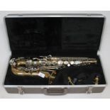 A Buescher Aristocrat 200 alto saxophone, serial number 830186 with mouthpiece and hard case.