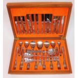 A light oak canteen of Old Hall stainless steel cutlery with two extra matching salad servers and