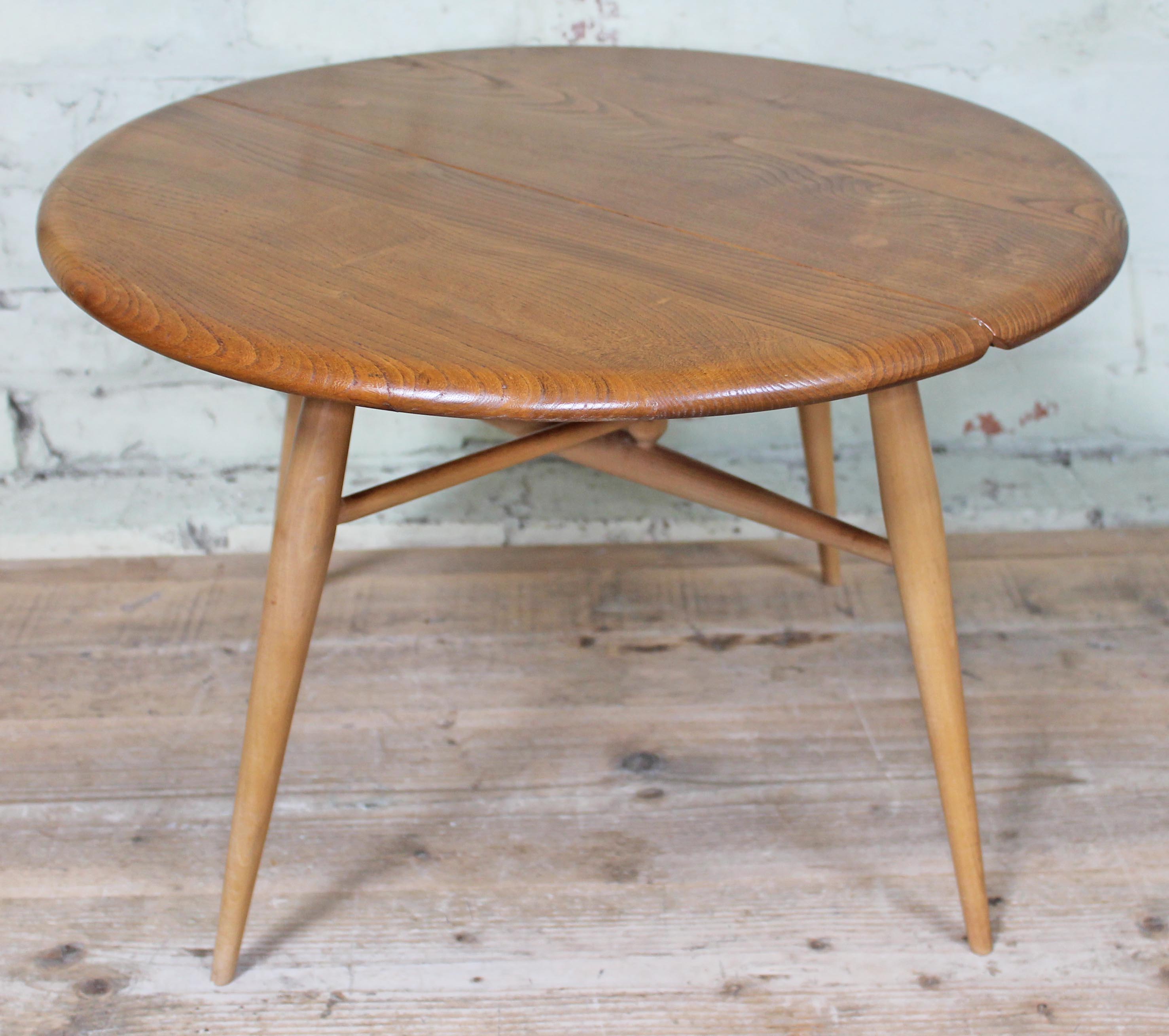 An Ercol blonde elm and beech occasional coffee table with drop leaf, length 61cm, min. depth 37cm & - Image 2 of 6
