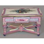 A 19th century French porcelain casket or trinket box formed as a centre table with X-frame