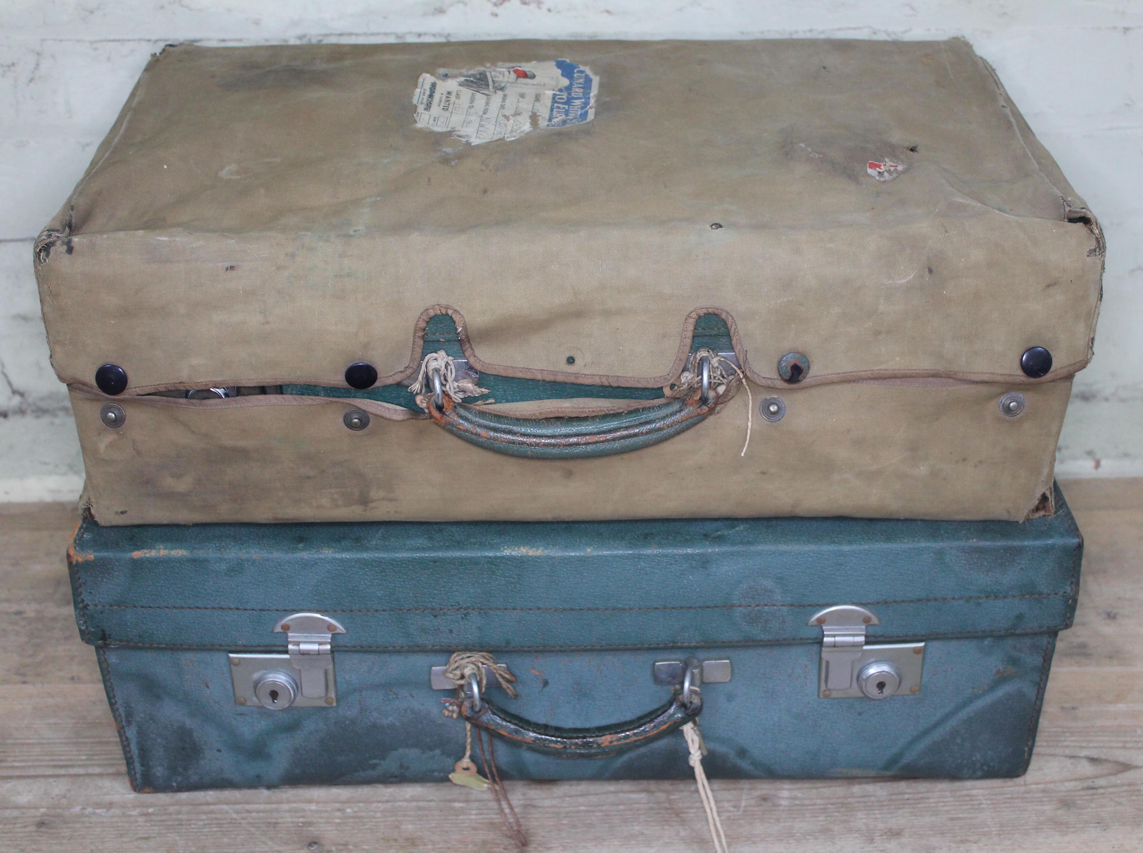 Two Mappin & Webb green leather travel cases circa 1940s, with with cover having Cunard White Star