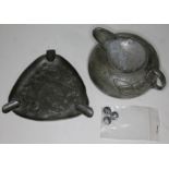 Three pieces of Art Nouveau pewter comprising two designed by Archibald Knox numbers 0231, 0898