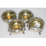 A set of four hallmarked silver salts with gilt interiors, diam. 7.5cm each, gross weight approx