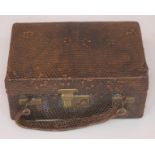 A snakeskin jewellery box, length 17cm.