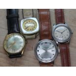 A group of four vintage wristwatches including a 1939 Longines stainless steel 30mm