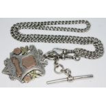 A hallmarked silver Albert chain with T bar and fob with two colour gold overlay, length 44cm, wt.