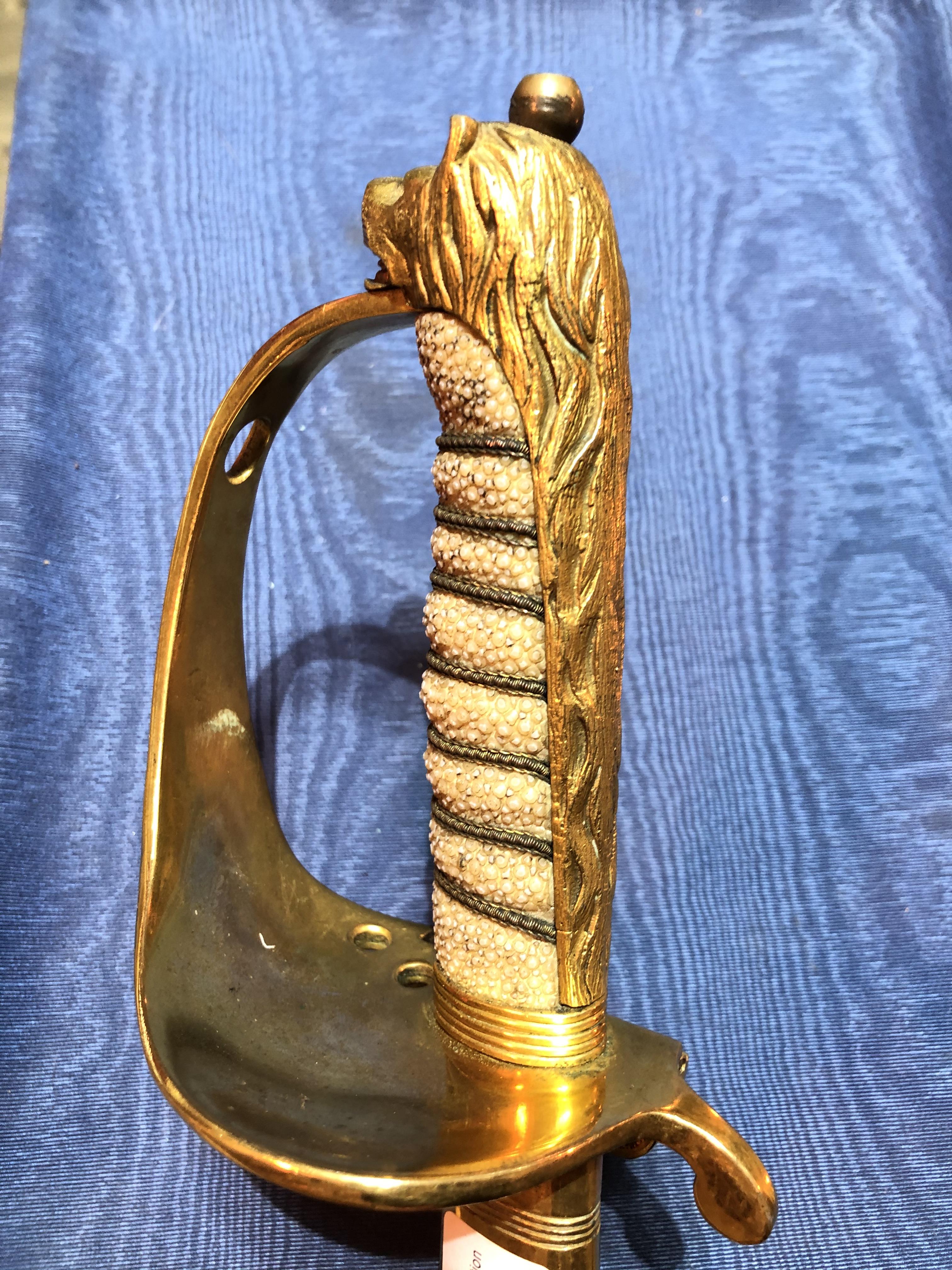 An Elizabeth II Navy officer's sword, the etched blade signed Gieves, with folding gilt brass hilt - Image 6 of 15