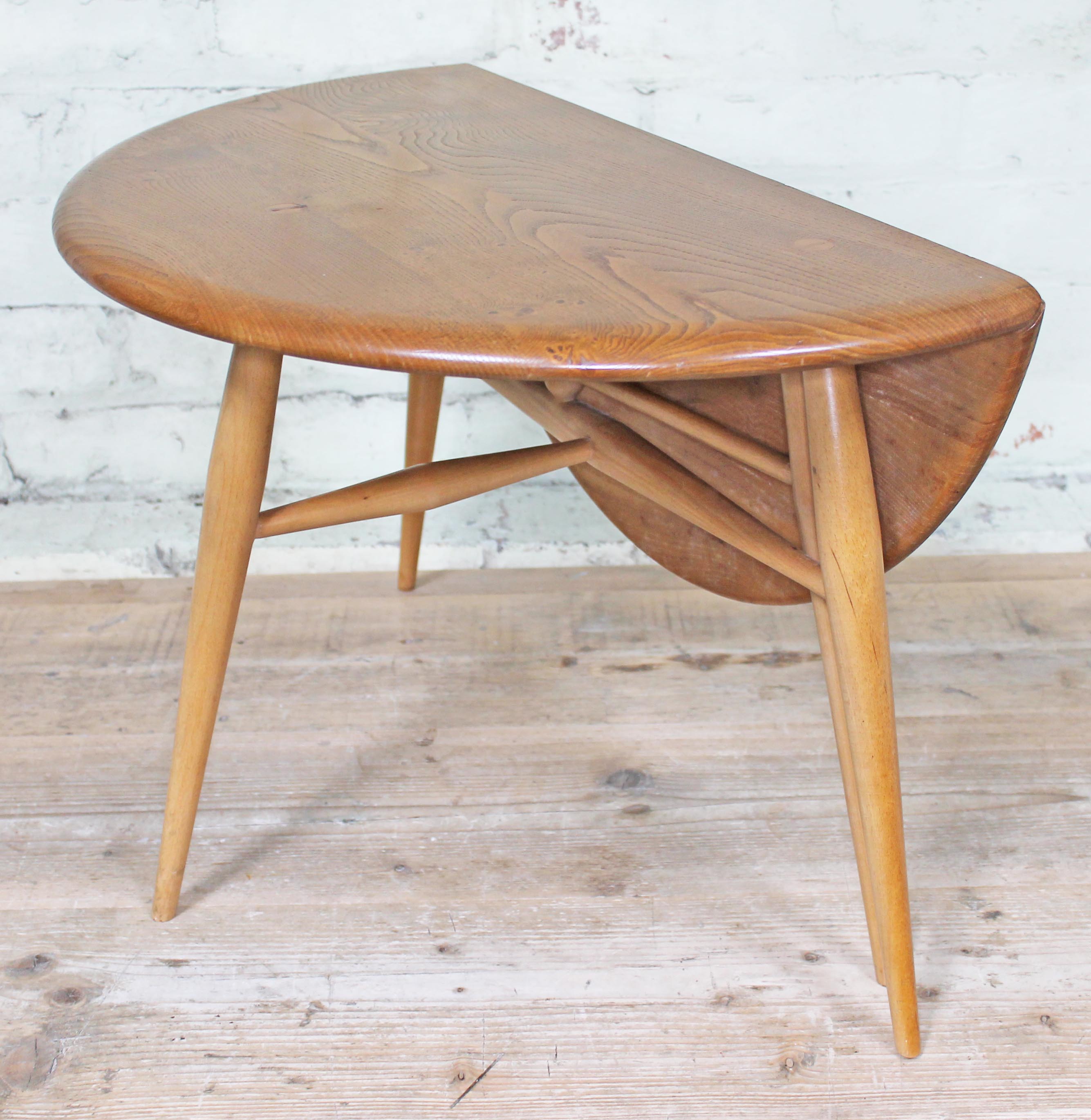 An Ercol blonde elm and beech occasional coffee table with drop leaf, length 61cm, min. depth 37cm & - Image 4 of 6