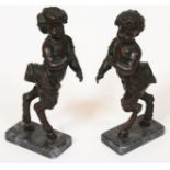 A pair of bronze cherub fauns on marble bases, unmarked, height 27cm.