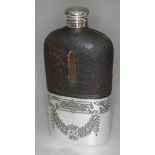 A large silver plated and leather hip flask, height 22cm.