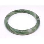 A jade coloured vintage glass bangle, diam. 8cm.