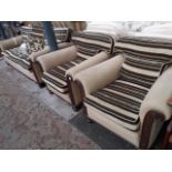 A three piece carved oak framed suite circa 1920s, re-upholstered in striped brown, beige and cream.