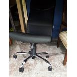 A Staples office swivel chair
