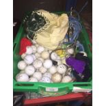 A box of misc golf balls.