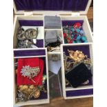 A jewellery and contents including mainly vintage costume jewellery.