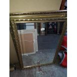 Two ornate framed mirrors