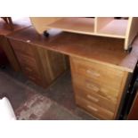 An oak twin pedestal desk