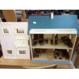 A dolls house and furniture