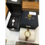 A Limit wristwatch and a Adrienne Vittadini gold tone wristwatch - both in boxes.