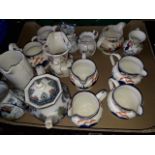 A box of pottery jugs