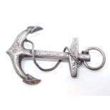 A vintage white metal brooch formed as an anchor, length 75mm, wt. 11.47g.