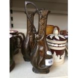 A pair of art deco style spelter jugs