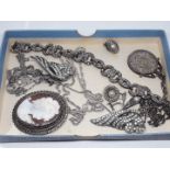 A mixed lot of silver and white metal jewellery.