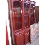 A glazed top lounge display cabinet