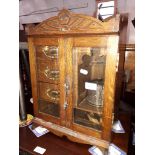 An oak smokers cabinet