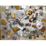 A tray of badges
