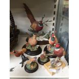 A group of six Country Artists figures depicting game birds, along with one other