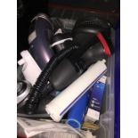 A box of shavers, electronic toothbrushes, accessories, etc.