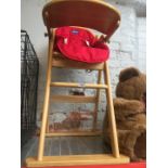 A Mothercare wooden high chair