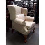 A Duresta wing back armchair