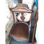 A mahogany inlaid chair
