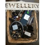 A large basket of costume jewellery