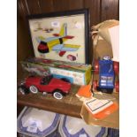 Plane plastic jigsaw picture, model car, toy glider and a Marvel clockwork tractor
