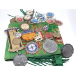 A mixed lot of mainly medals and badges comprising an Ancient Order of Foresters sash, three Girl