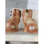 A pair of Staffordshire ceramic dogs