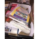 A box of misc to include printer cartridges, household items, etc.