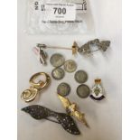 A mixed lot comprising an RAF winged badge, other badges and coins etc.
