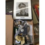 A German military photograph and a tray of insignia etc
