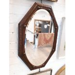 An oak framed mirror