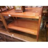 A teak two tier table